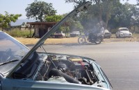 Smoke pours out of the engine